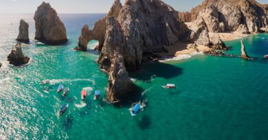 Downward Looking Aerial of the shallow water in Cabo San Lucas, Baja California Sur, Mexico near the Darwin Arch glass bottom boats viewing sealife