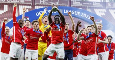 AZ Alkmaar's Ernest Poku celebrates with his teammates and the Youth League trophy after the Youth League final soccer match between AZ Alkmaar and HNK Hajduk Split at the Stade de Geneve stadium, in Geneva, Switzerland, Monday, April 24, 2023.