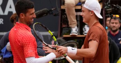 Denmark's Holger Rune, right, celebrates after winning the quarter final match against Serbia's Novak Djokovic at the Italian Open tennis tournament, in Rome, Wednesday, May 17, 2023. (AP Photo/Gregorio Borgia)