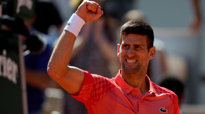 Serbia's Novak Djokovic celebrates winning his fourth round match of the French Open tennis tournament against Peru's Juan Pablo Varillas at the Roland Garros stadium in Paris, Sunday, June 4, 2023. (AP Photo/Thibault Camus)