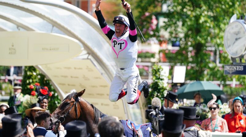 Frankie Dettori with a flying dismount after winning the Albany on Porta Fortuna