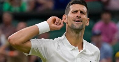 Serbia's Novak Djokovic celebrates after beating Switzerland's Stan Wawrinka in a men's singles match on day five of the Wimbledon tennis championships in London, Friday, July 7, 2023. (AP Photo/Alberto Pezzali)