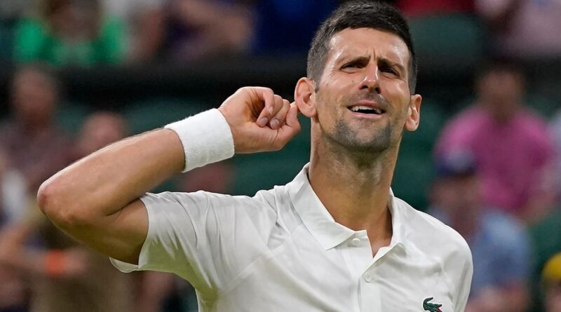 Serbia's Novak Djokovic celebrates after beating Switzerland's Stan Wawrinka in a men's singles match on day five of the Wimbledon tennis championships in London, Friday, July 7, 2023. (AP Photo/Alberto Pezzali)