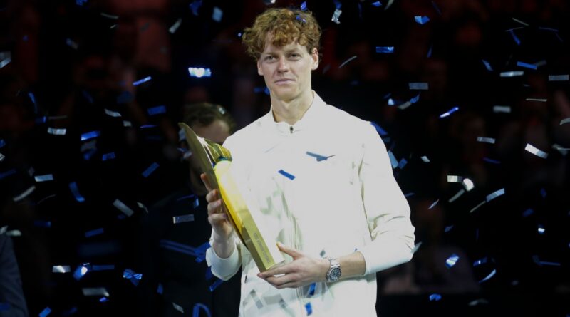 Jannik Sinner of Italy celebrates with the trophy after winning the final match of the Erste Bank Open ATP tennis tournament against Daniil Medvedev of Russia, in Vienna, Austria, Sunday, Oct. 29, 2023. Sinner won 7-6 (7), 4-6, 6-3. (AP Photo/Heinz-Peter Bader)