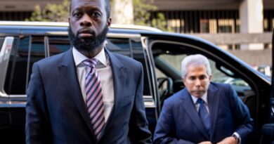 Ex-DOJ employee who testified against Fugees rapper sentenced