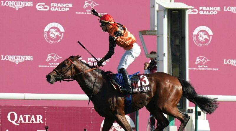 Cristian Demuro celebrates as Ace Impact wins the Prix de l'Arc de Triomphe