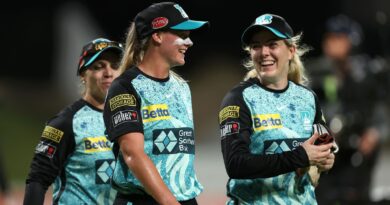 Brisbane Heat's Courtney Sippel and Georgia Redmayne after beating Sydney Thunder