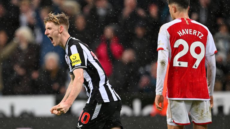 Anthony Gordon celebrates after scoring in the second half