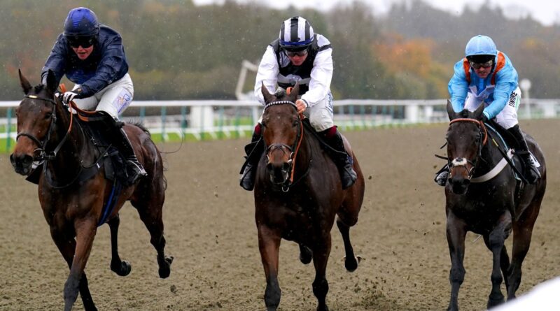 Ask Her Out ridden by jockey Tabitha Worsley (left) on their way to winning the Weatherbys & Birdie Calendars Open National Hunt Flat at Lingfield