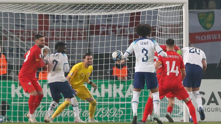 North Macedonia's Jani Atanasov, second from right, scores an own goal during the Euro 2024 group C qualifying soccer match between North Macedonia and England at National Arena Todor Proeski in Skopje, North Macedonia, Monday, Nov. 20, 2023. (AP Photo/Boris Grdanoski)