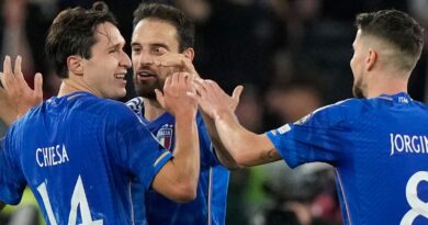 Italy's Federico Chiesa, left, celebrates with his teammates Italy's Giacomo Bonaventura and Jorginho after scoring his sides second goal during an Euro 2024 group C qualifying soccer match between Italy and North Macedonia, at the Olympic Stadium stadium in Rome Friday, Nov. 17, 2023. (AP Photo/Andrew Medichini)