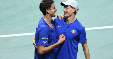 Italy's Jannik Sinner (R) and Lorenzo Sonego celebrate after winning against Serbia's Novak Djokovic and Momir Kecmanovic during the men's doubles semifinal tennis match between Italy and Serbia of the Davis Cup tennis tournament at the Martin Carpena sportshall, in Malaga on November 25, 2023. (Photo by JORGE GUERRERO / AFP) (Photo by JORGE GUERRERO/AFP via Getty Images)