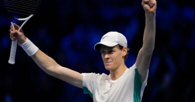 Italy's Jannik Sinner celebrates after winning the singles tennis match against Serbia's Novak Djokovic, of the ATP World Tour Finals at the Pala Alpitour, in Turin, Italy, Tuesday, Nov. 14, 2023. (AP Photo/Antonio Calanni)