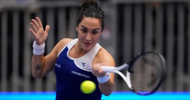 Italy's Martina Trevisan returns to Germany's Eva Lys during their group stage tennis match at the Billie Jean King Cup finals at La Cartuja stadium in Seville, southern Spain, Spain, Thursday, Nov. 9, 2023. (AP Photo/Manu Fernandez)