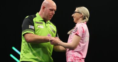 Grand Slam of Darts: Fallon Sherrock beaten by Michael van Gerwen as Michael Smith makes winning start to title defence