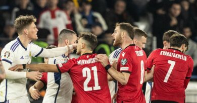 TBILISI, GEORGIA - NOVEMBER 16: Scotland's Scott McTominay argues with Georgia players after Giorgi Kochorashvili goes down holding his face during a UEFA Euro 2024 Qualifier between Georgia and Scotland at the Boris Paichadze Dinamo Arena, on November 16, 2023, in Tbilisi, Georgia. (Photo by Craig Williamson / SNS Group)