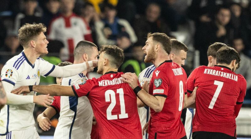 TBILISI, GEORGIA - NOVEMBER 16: Scotland's Scott McTominay argues with Georgia players after Giorgi Kochorashvili goes down holding his face during a UEFA Euro 2024 Qualifier between Georgia and Scotland at the Boris Paichadze Dinamo Arena, on November 16, 2023, in Tbilisi, Georgia. (Photo by Craig Williamson / SNS Group)