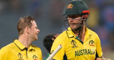 Australia's Steve Smith and Mitchell Marsh walk back to pavilion after winning the ICC Men's Cricket World Cup match between Australia and Bangladesh in Pune, India, Saturday, Nov. 11, 2023. (AP Photo/Rafiq Maqbool)