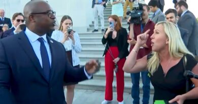 Jamaal Bowman and Marjorie Taylor Greene argue on the Capitol steps.