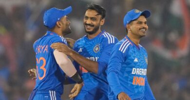 India's Axar Patel celebrates the dismissal of Australia's Aaron Hardie with India's captain Suryakumar Yadav