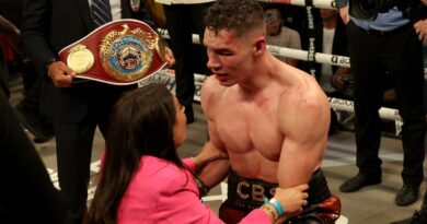 Chris Billam-Smith with his wife after his world title victory