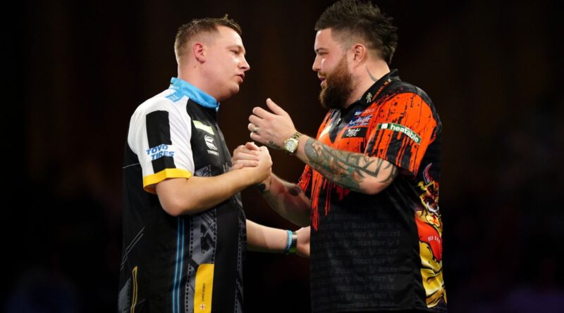 World Darts Championship: Michael Smith is dethroned by Chris Dobey as Michael van Gerwen and Gary Anderson win