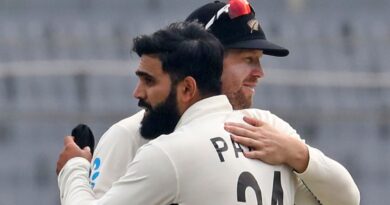 Ajaz Patel is congratulated by New Zealand team-mate Devon Conway after taking a Bangladesh wicket in the second Test in Mirpur (AP)