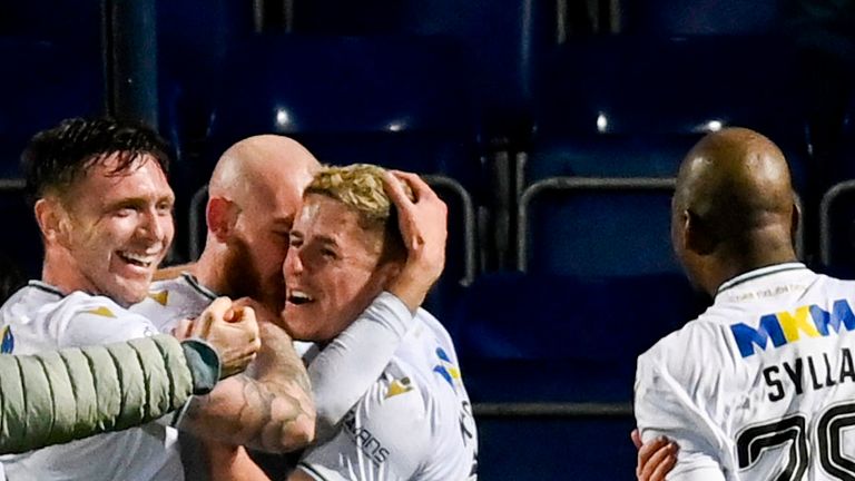 Dundee's Joe Shaughnessy (L) celebrates scoring against Ross County