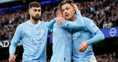 Manchester City's Jack Grealish celebrates with Phil Foden after scoring