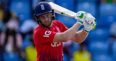 England's captain Jos Buttler plays a shot from the bowling of West Indies' Akeal Hosein..during the third T20 cricket match at National Cricket Stadium in Saint George's, Grenada, Saturday, Dec. 16, 2023. (AP Photo/Ricardo Mazalan)