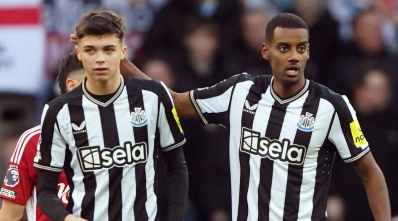 Goalscorer Alexander Isak celebrates with team-mate Lewis Miley