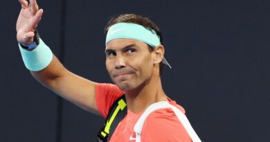 Rafael Nadal of Spain waves to the crowd in his doubles match against Australia's Max Purcell and Jordan Thompson during the Brisbane International tennis tournament in Brisbane, Australia, Sunday, Dec. 31, 2023. (AP Photo/Tertius Pickard)