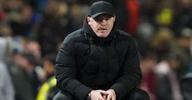 Wayne Rooney looks on dejected as Birmingham manager