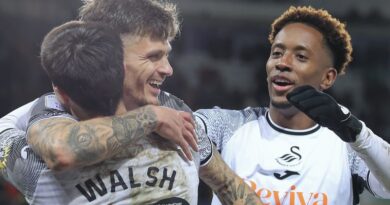 SWANSEA, WALES - DECEMBER 22: Jamie Paterson of Swansea City (C) with Liam Walsh (L) and Jamal Lowe (R) celebrates his goal during the Sky Bet Championship match between Swansea City and Preston North End at the Swansea.com Stadium on December 22, 2023 in Swansea, Wales. (Photo by Athena Pictures/Getty Images)