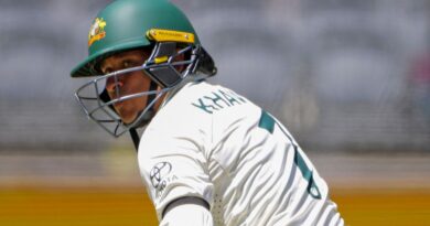 Australia batter Usman Khawaja wears a black armband during the Test match against Pakistan in Perth (Associated Press)