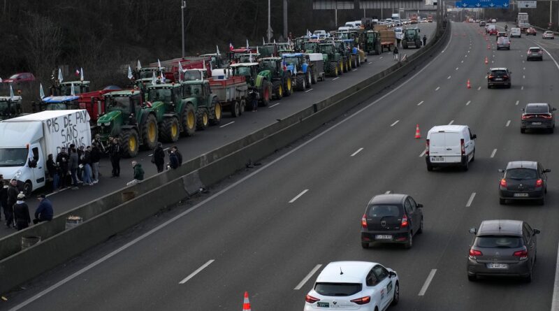 French farmers encircle Paris with an angry blockade