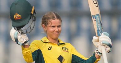 Australia's Phoebe Litchfield celebrates her century against India (Associated Press)