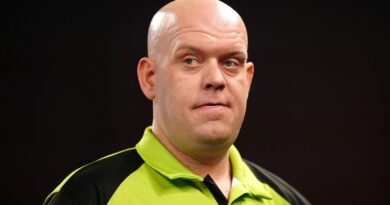 World Darts Championship: Michael van Gerwen suffers shock exit to Scott Williams in quarter-finals