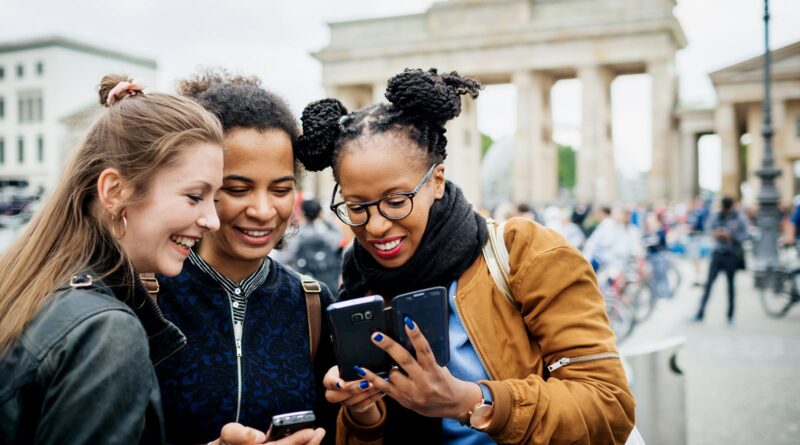 A Group Of Friends Exploring Berlin